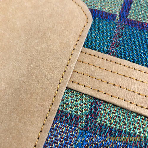 Détail d'une surpiqure sur du Kraft-Tex