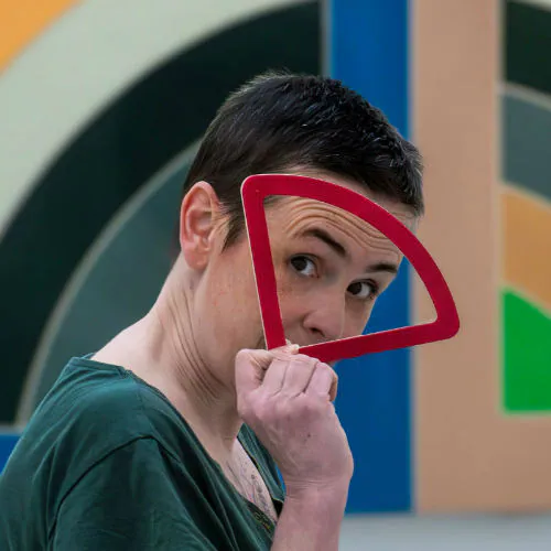Photo of Marie Alhomme in a museum