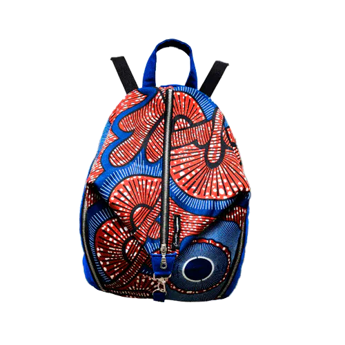 A backpack sewn with royal blue fabric and wax fabric in shades of blue, brown-red, black, and white.
