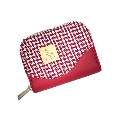 A zipped card-and-coin wallet made from red leather and a red leather printed with white houndstooth, with a red Sonia Rykiel branded lining.