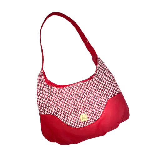 A shoulder bag made from red leather and red leather printed with white houndstooth, with a red Sonia Rykiel branded lining.