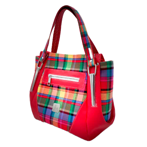 A shoulder bag made of blood-red faux leather and multicolored madras fabric.