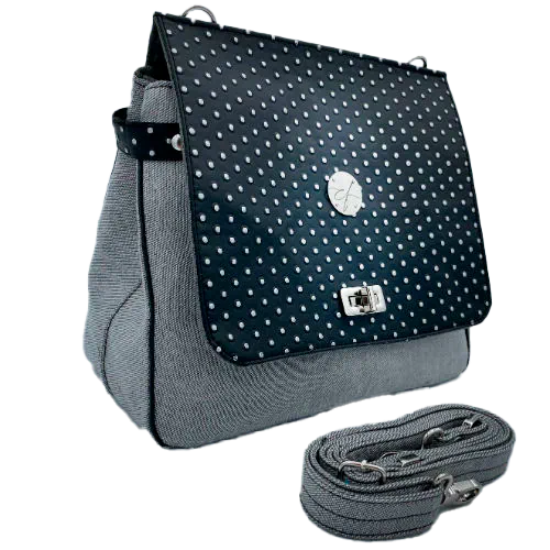 A boxy bag made with a silver dotted black vinyl and grey couture denim.