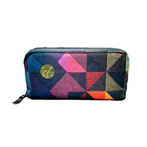 A zippered card and coin holder made from a black and rainbow babywearing wrap with a geometric pattern, royal blue poplin interior.