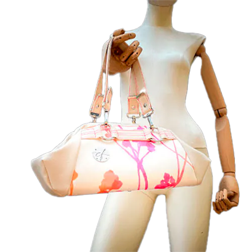 Un petit sac à main constitué de simili crème et tissu d'ameublement crème, au motif végétal dégradé de rose à orange.